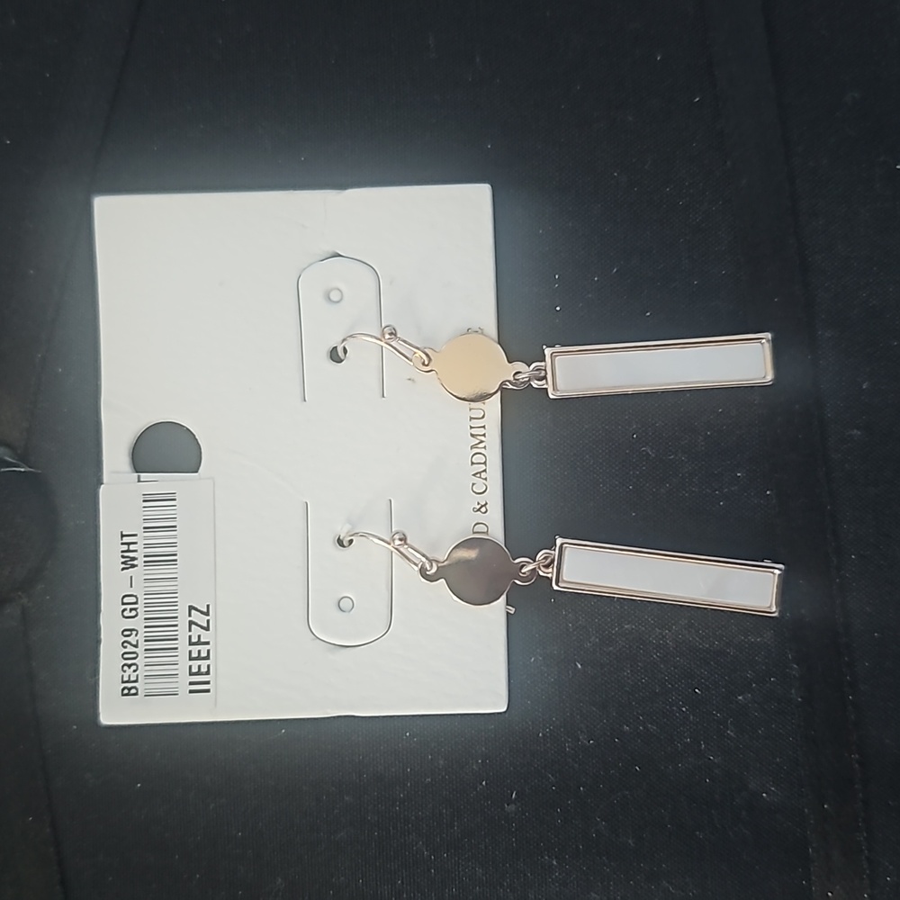 White and gold dangling earrings